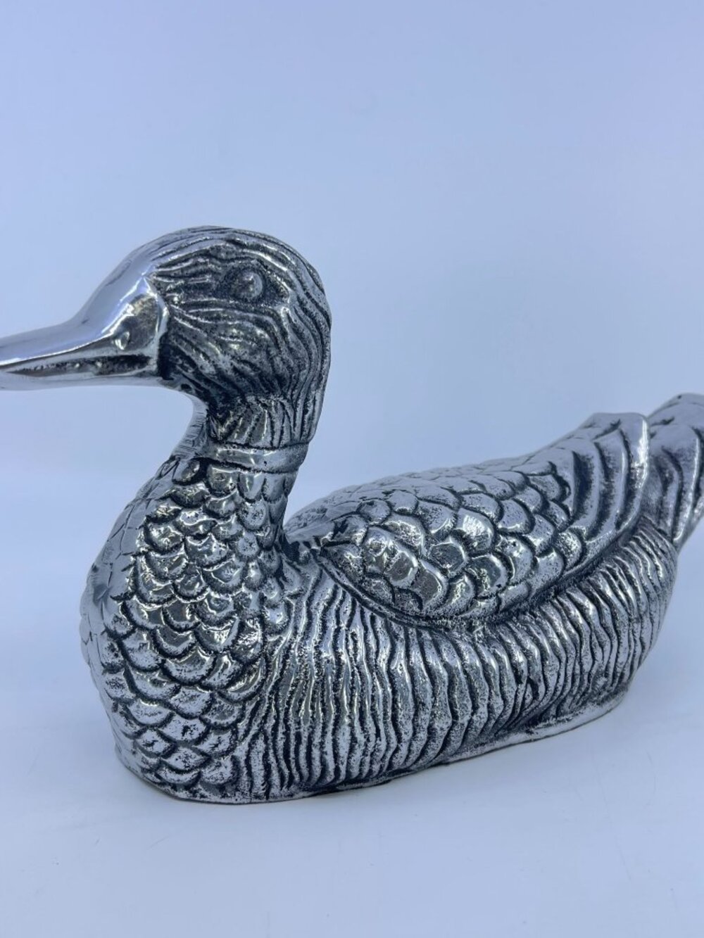 vintage cast aluminum duck figurine highly textured detailing
